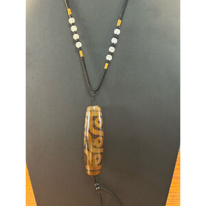 Boho corded necklace with tribal influenced glass pendant